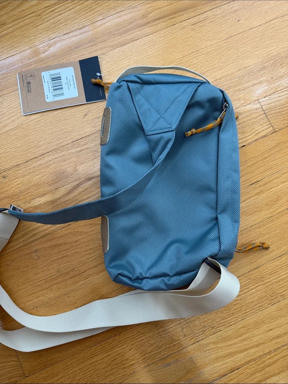 The North Face Teal Sling Bag with Cream Strap New with Tags
